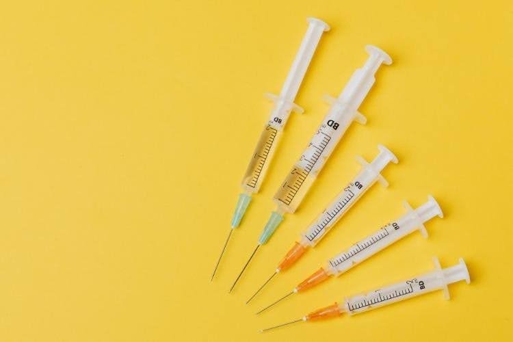 Medical syringes illustrating gradual dose increases during a weight loss medication plan.