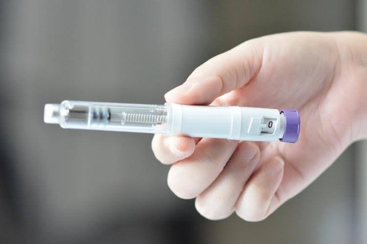 Weekly weight loss injection pen for obesity treatment.